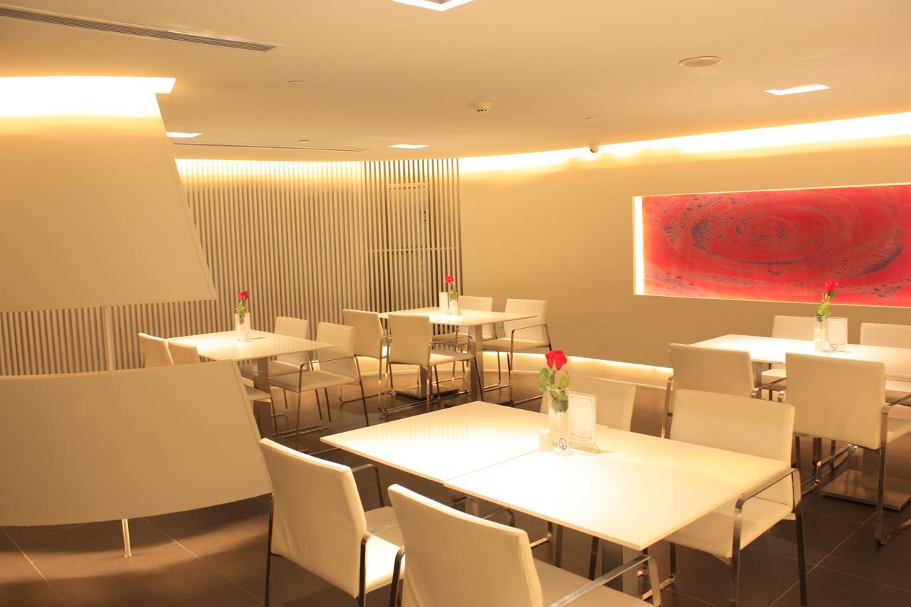 Magnolia Business Hotel Xining Railway Station Grand Cross Mojia Street Екстер'єр фото